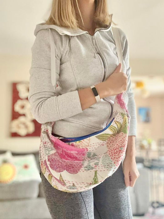 Floral embroidered sling purse