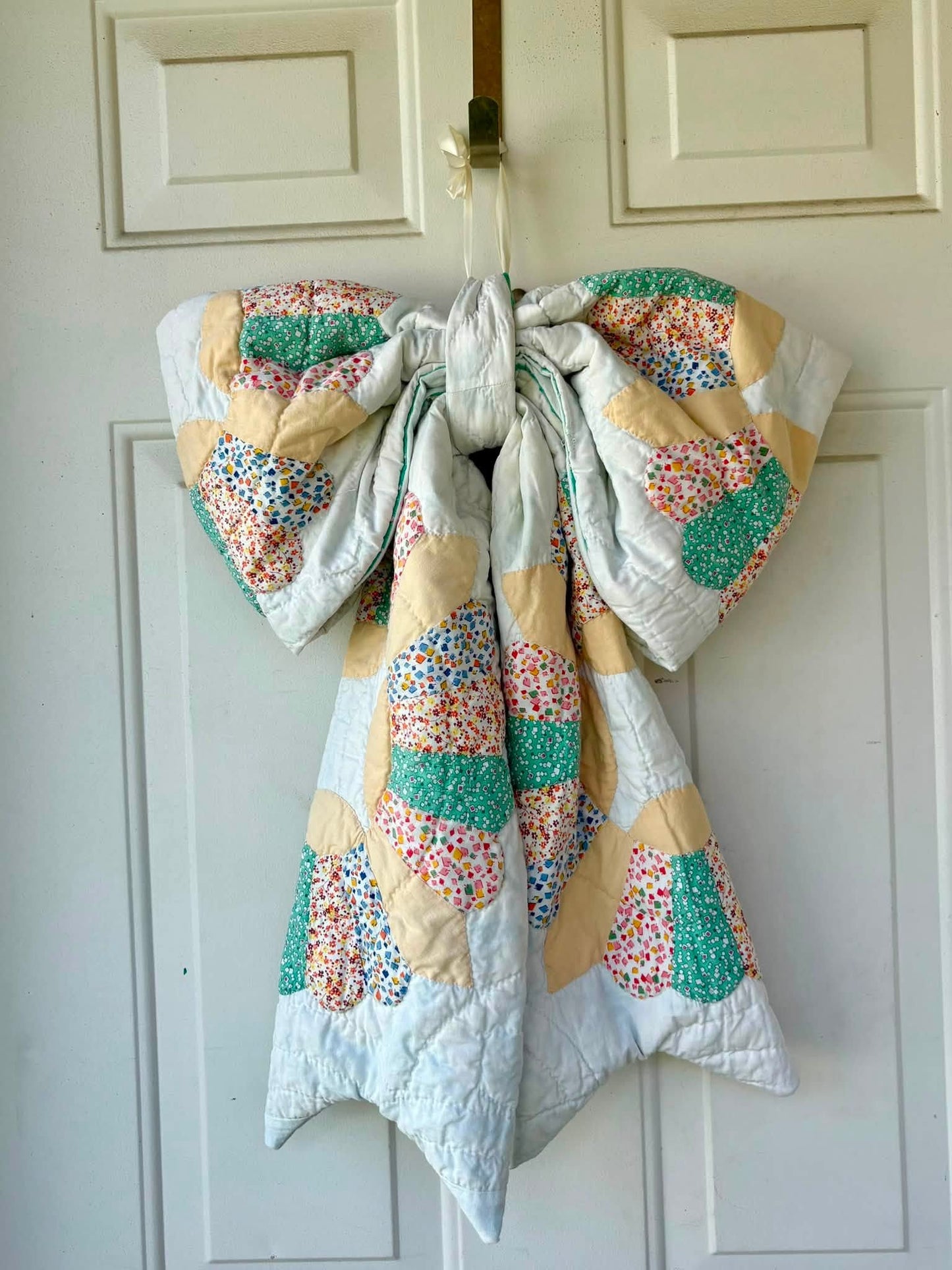 Spring colors quilted door bow